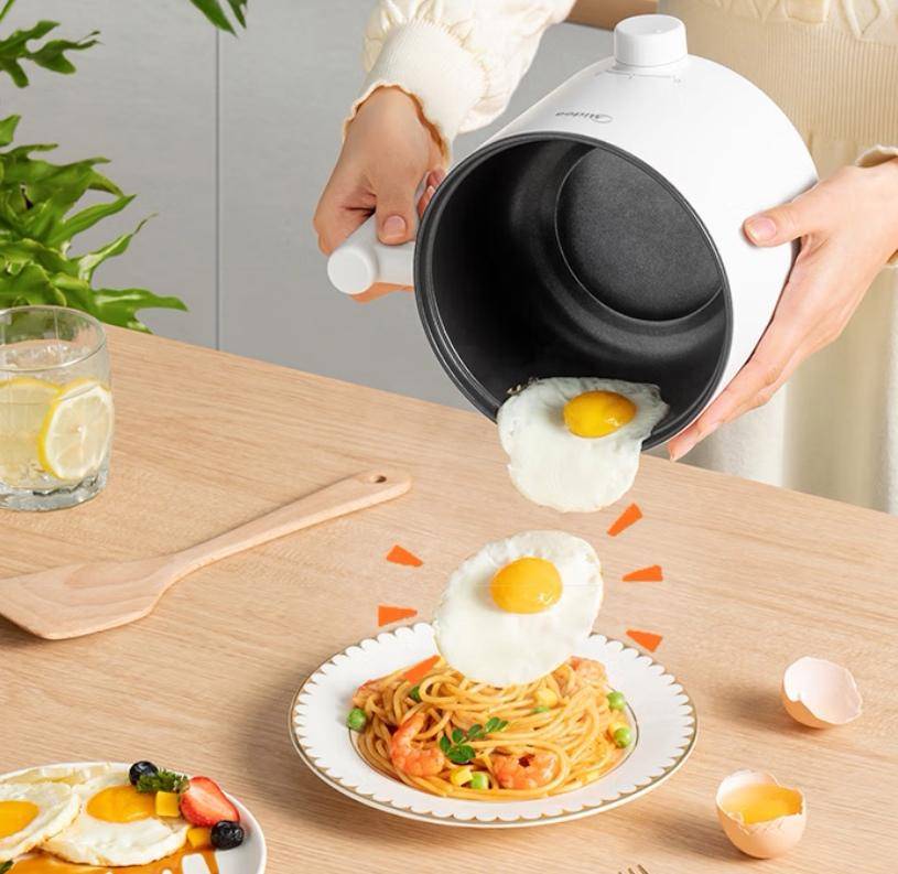 食小宇宙一锅承包你的味蕾盛宴！k8凯发国际登录美的电煮锅美(图4)
